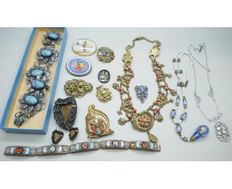 A collection of vintage jewellery including micro mosaic examples, a ceramic plaque brooch, necklaces, a matching necklace an