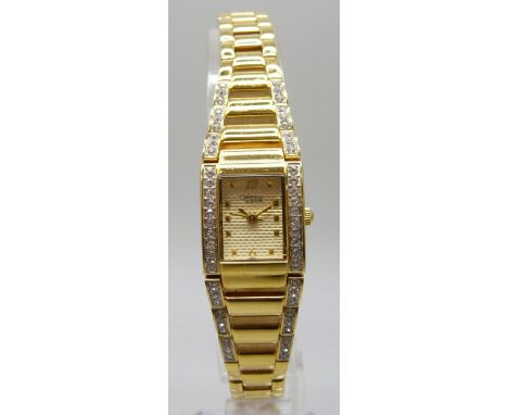 A Caravelle Bulova lady's wristwatch set with cubic zirconia stones, 19mm including crown, boxed