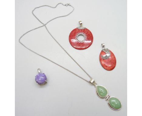 Four silver mounted pendants and necklaces, pendants set with red coral, purple Russian chavorite 10.25ct, Roy Bali red coral