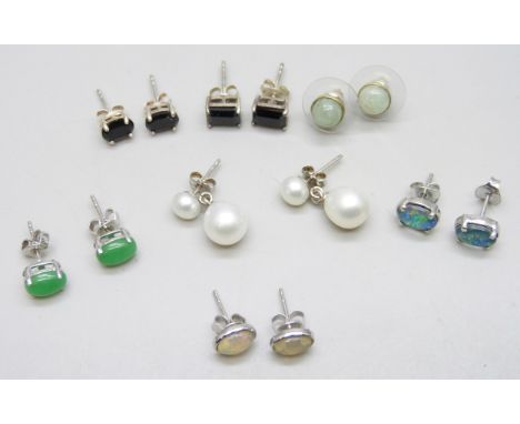Seven pairs of silver stud earrings set with boi ploi black spinel, green jade, boulder opal 1.75cts, and freshwater pearls
