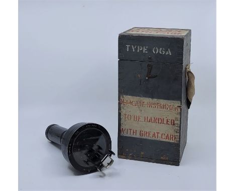 A WWII British military 06A hand bearing compass, impressed broad military arrow, in fitted grey painted and stencilled box.