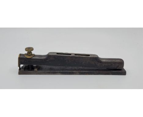 A Rabone No.1375 Strong iron level, 9 1/4in. size, with brass screw adjustment and scale showing fall per yard, base stamped 