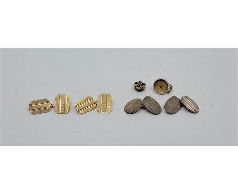 A pair of 9ct. gold engine turned rectangular cuff links, chain link (5.6g), together with a pair of silver engine turned ova