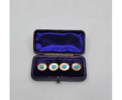 A pair of 18ct. gold, red guilloche enamel, mother of pearl and turquoise set oval cuff links, chain link, each face with con
