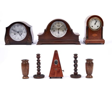 A walnut mantel clock, c1930,&nbsp; with chiming movement, 23.5cm h, two others, a metronome, pair of turned wood vases and a
