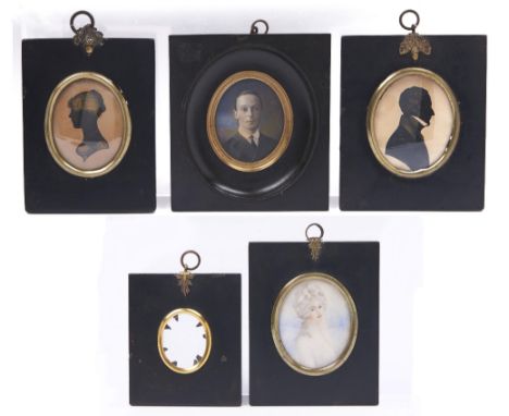 Two early Victorian silhouettes of a lady and gentleman,&nbsp; ink on card, oval, 72mm and c, papier mache frames with brass 