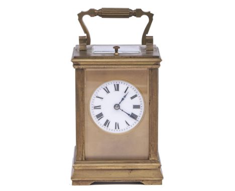 A French brass carriage clock, c1900,&nbsp;the movement with silvered platform lever escapement and striking on a coiled wire