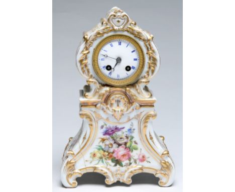 A French porcelain mantel clock, c1840, with bell striking movement and enamel dial, in richly gilt rococo style case painted