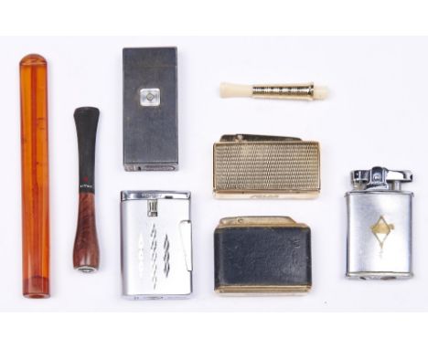 Five vintage Ronson and other lighters and three cigarette holders  Good condition