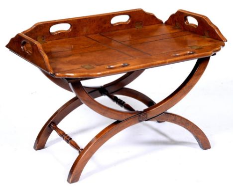 A burr walnut butler's tray, in George III style, with lacquered brass hinges to the pierced sides, 50 x 83cm and a stand (2)