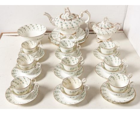A Samuel Alock tea service, c1845, decorated with a spiralling turquoise and gilt set pattern, pattern No 8294  Some wear and