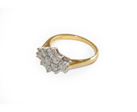 An 18 carat gold diamond cluster ring, finger size PCondition report: Gross weight 4.2 grams.