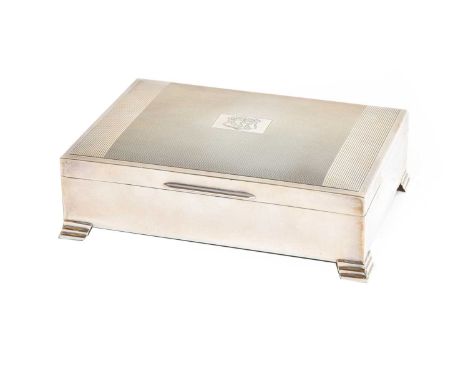 An Elizabeth II Silver Cigarette-Box, by Emile Viners, Sheffield, 1964, oblong and on four stepped feet, the slightly domed c