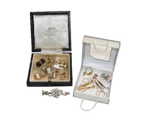 An Edwardian silver and gold brooch, length 4.8cm; a cameo ring, brooch and pair of earrings; a 9 carat gold cameo pendant; t