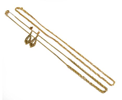 A 9 carat gold blue zircon pendant on chain, chain length 40cm; a 9 carat gold bull pendant on chain, chain length 44cm; two 