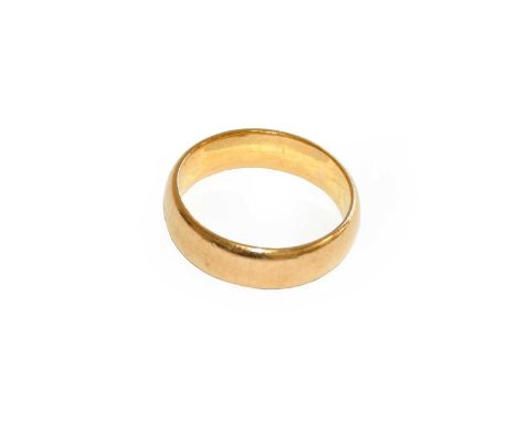 A 22 carat gold band ring, finger size LCondition report: Gross weight 5.9 grams.