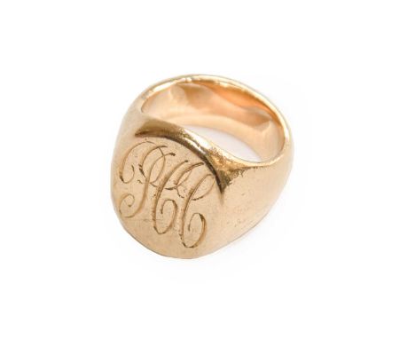A signet ring engraved with monogram, finger size M1/2Condition report: Unmarked, gross weight 18.7 grams.