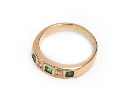 An emerald and diamond five stone ring, finger size N1/2Condition report: Gross weight 5.6 grams.