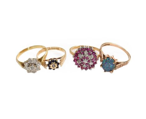 An 18 carat gold diamond cluster ring, finger size R; a 9 carat gold sapphire and diamond cluster ring, finger size N1/2; a 9