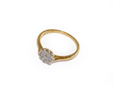 An 18 carat gold diamond cluster ring, finger size RCondition report: Gross weight 3.1 grams.