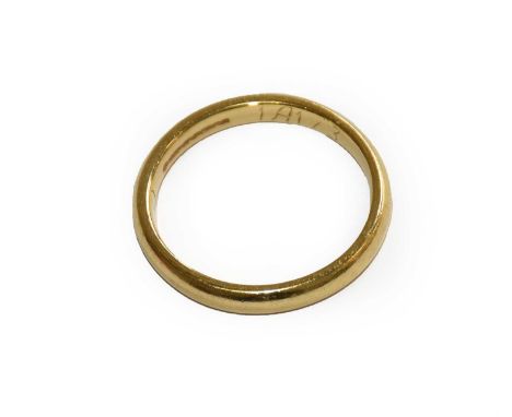 An 18 carat gold band ring, finger size OCondition report: Gross weight 4.0 grams.