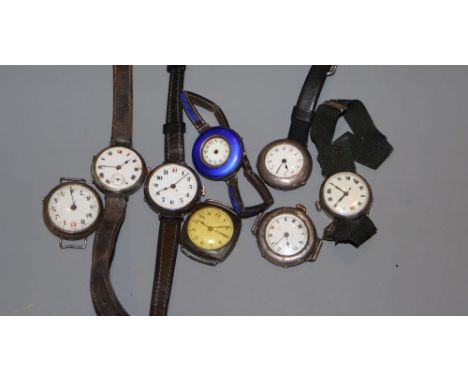 Eight assorted early 20th century and later silver wrist watches, including blue enamel case.