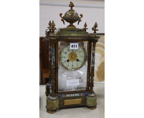 An Edwardian champleve enamel and onyx four glass clock, with presentation plaque, H.40cm