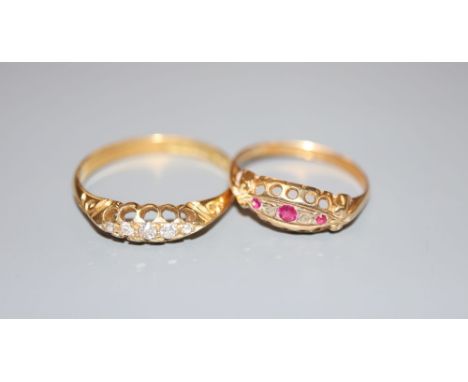 A George V 18ct gold and graduated five stone diamond ring, size X and a similar ruby and diamond ring, size P, gross 5.7 gra