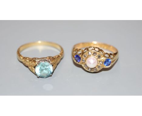 An early 20th century 18ct, cultured pearl blue paste and rose cut diamond set cluster ring, size M, gross 2.5 grams and an 1