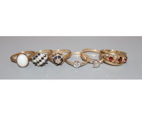 Five assorted modern 9ct gold and gem or paste set dress rings and one other ring, 9ct gross 10 grams.