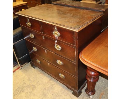 An 18th century oak chest fitted two short drawers and three long drawers with brass handles, on bracket feet, W.98cm, D.52cm