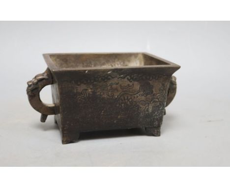 A Chinese bronze two handled censer, W.16cm including handles