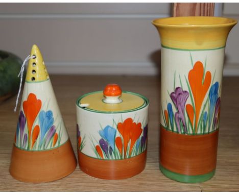 A Clarice Cliff crocus conical caster, preserve jar and a spill vase, tallest 13cmCONDITION: The conical shaped piece has cra