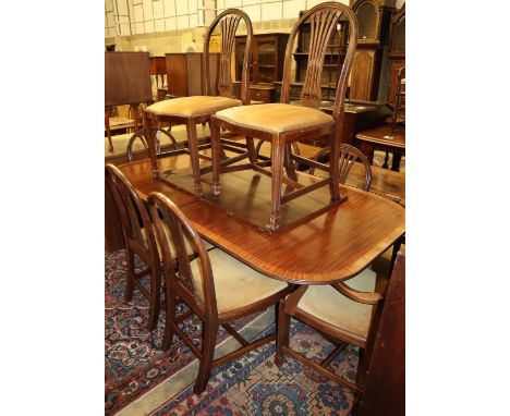 A set of eight Hepplewhite style mahogany dining chairs (two with arms), together with a George III style mahogany twin pilla