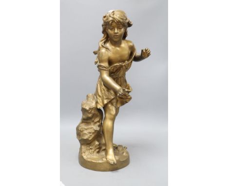 An early 20th century gold painted bronze model of a girl, height 50cm
