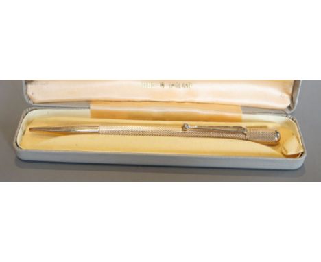 An engine turned 9ct gold cased propelling pencil, maker, S.J. Rose &amp; Son.