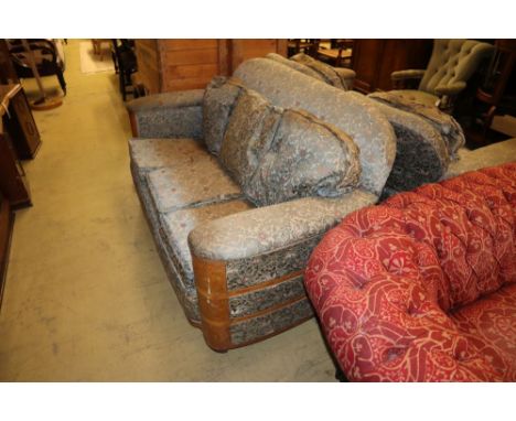 An Art Deco upholstered birds eye maple three piece lounge suite, settee W.168cm, D.100cm, H.86cmCONDITION: In need of comple