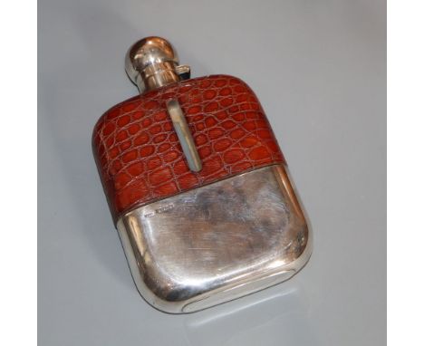 A George V silver and leather mounted glass hip flask, James Dixon &amp; Sons, Sheffield, 1924, 16.8cm.CONDITION: Engraved mo