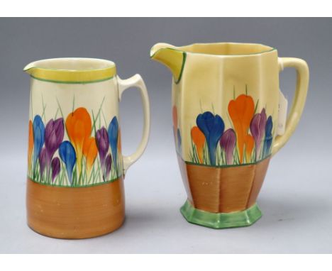 Two Clarice Cliff crocus pattern jugs, tallest 20cmCONDITION: Tallest has a possible ground down chip to the footrim and is h