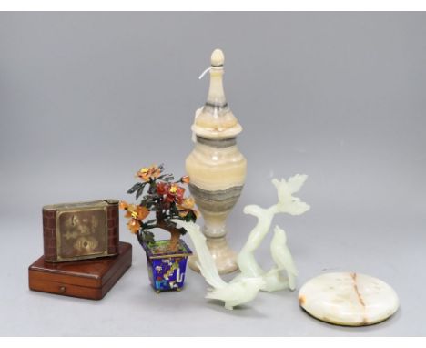 A Chinese hardstone tree, an onyx vase, a broken figure, an alarm clock and a match box