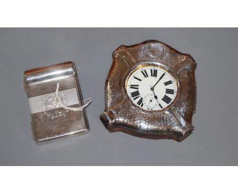 An Edwardian silver cigarette case with patent pipe filler, Birmingham, 1909, 9cm and a silver mounted travelling watch case,