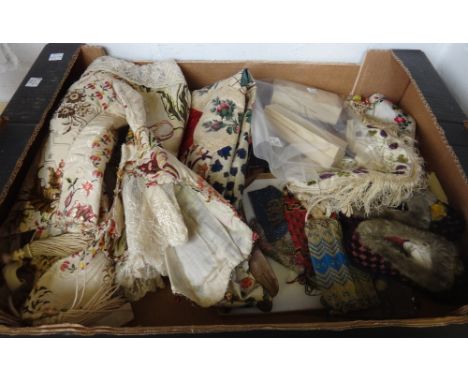 A quantity of textiles and collectables, including; an early 20th century foliate embroidered lady's waistcoat, a pair of sma