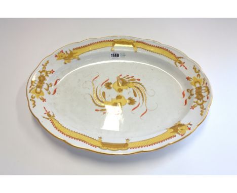 A Meissen porcelain oval charger, circa 1900, centrally decorated with stylized exotic birds within a shaped border decorated