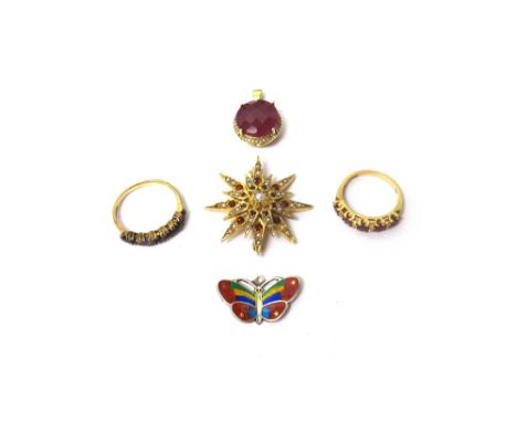 A 9ct gold and ruby set five stone ring, mounted with a row of circular cut rubies, ring size M and a half, a ruby set pendan