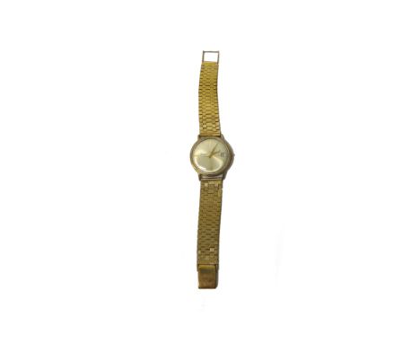 A gentleman's 9ct gold, circular cased Accurist wristwatch, the signed circular silvered dial with baton shaped numerals, cen