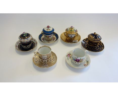 Six European porcelain cups and trembleuse saucers, late 18th century to late 19th century. (6)