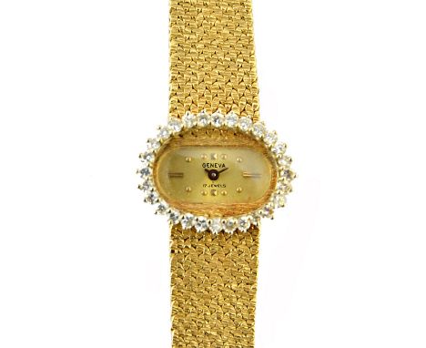 A lady's gold and diamond set Geneva bracelet wristwatch, with a signed oval gilt dial, having a border of claw set circular 