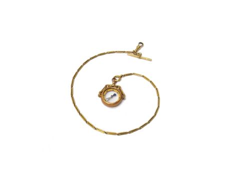 A 9ct gold mounted compass pendant fob and a gold twin bar link dress Albert chain, fitted with a gold T bar, a swivel and a 