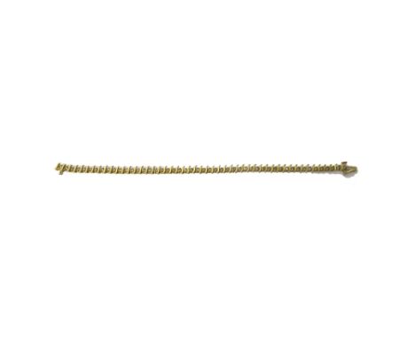 A gold and diamond set line bracelet, claw set with a row of circular cut diamonds, with 'S' shaped divisions at intervals, o
