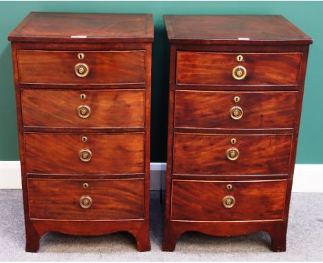 A pair of 19th century mahogany pedestals, each with four graduated drawers, on splayed bracket feet, 52cm wide.